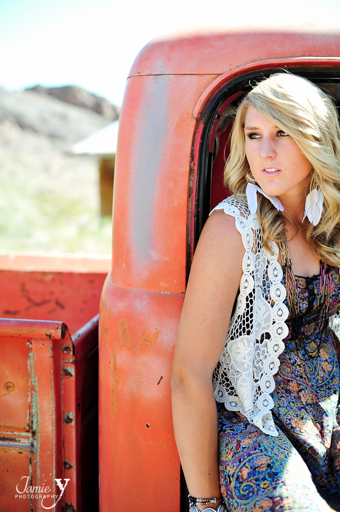 vegas-senior-11* girl looking out of an old truck at nelsons landing ghost town outside of las vegas
